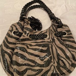 Zebra print large and roomy pocket book